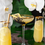 Elegant, exotic cocktail with lush fresh orchids